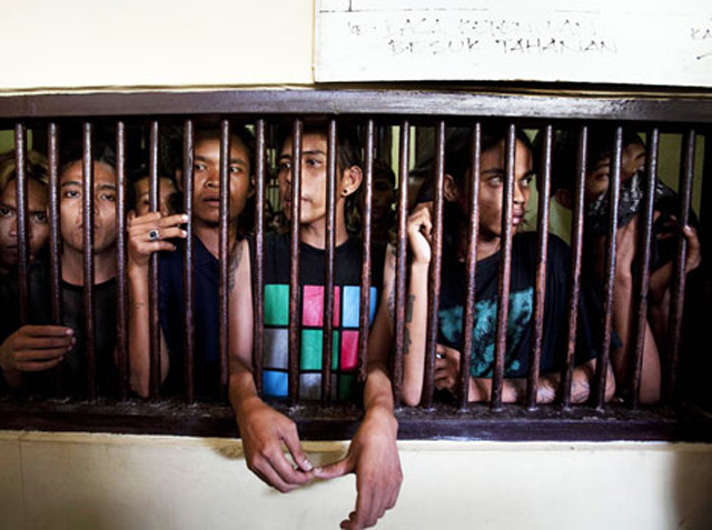 A group of arrested Indonesian punks are jailed in Bandah Aceh police station in Aceh province